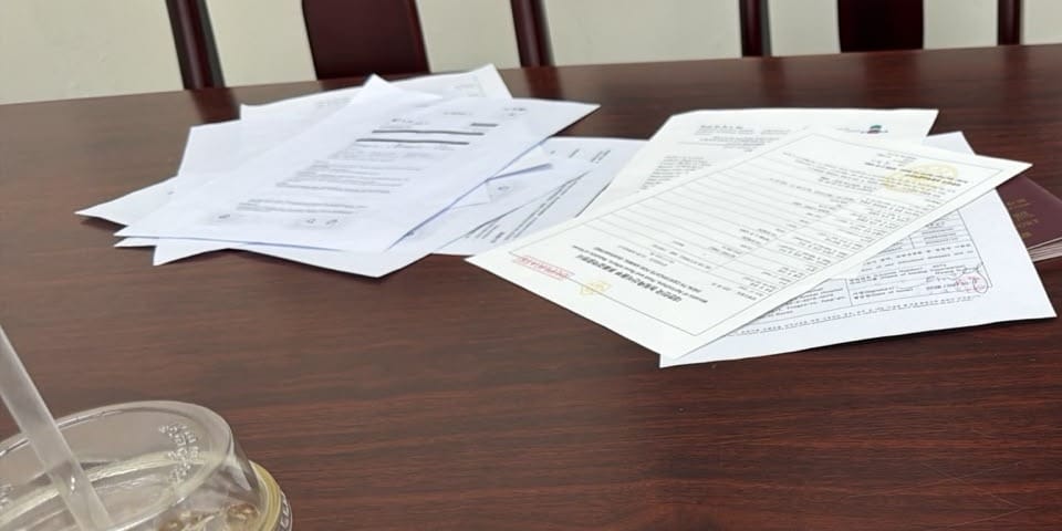 Pet documents laid out for a government veterinary check before a pet leaves Malaysia